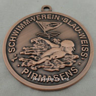 Die Stamped Swimming Medals